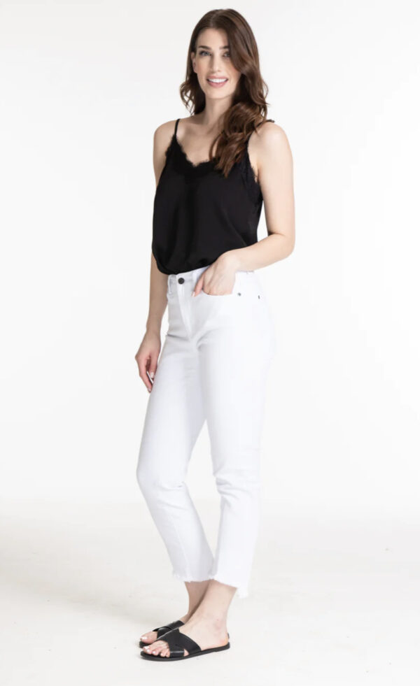 MULTIPLES ASYMMETRICAL FRINGE ANKLE JEANS
